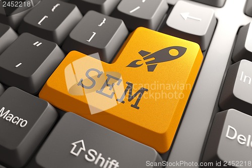 Image of Keyboard with SEM Orange Button.