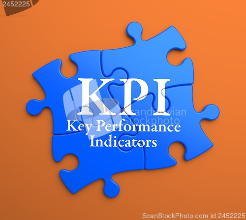 Image of KPI on Blue Puzzle Pieces. Business Concept.