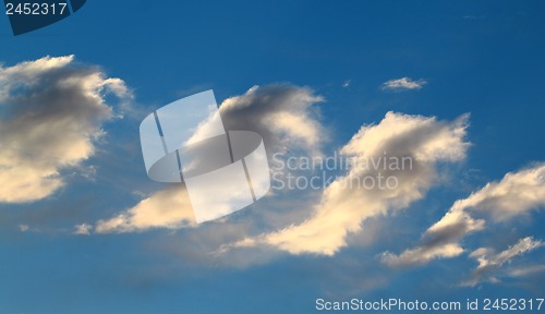Image of A dark cloud on a blue background