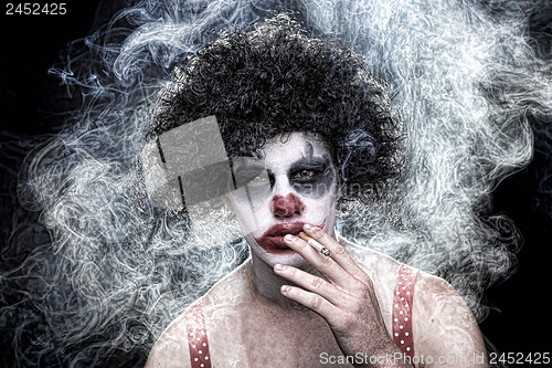 Image of Spooky Clown Portrait on Black Background