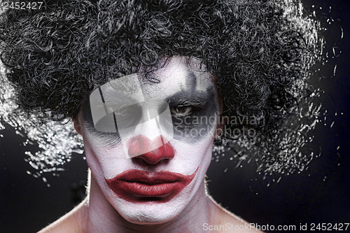 Image of Spooky Clown Portrait on Black Background