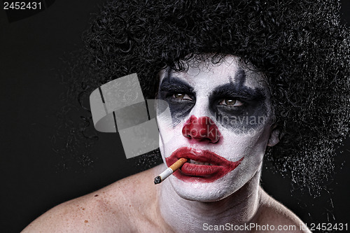 Image of Spooky Clown Portrait on Black Background