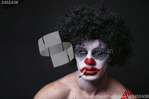 Image of Spooky Clown Portrait on Black Background