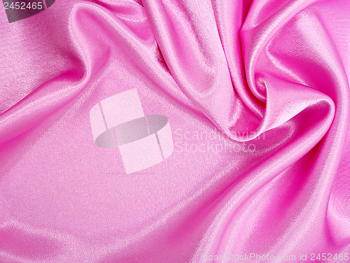 Image of Smooth elegant pink silk as background 