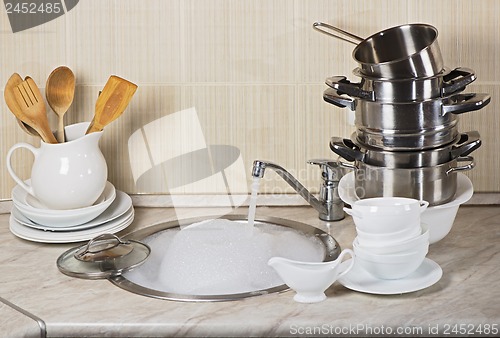 Image of Ware washing in kitchen