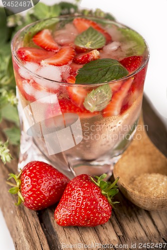 Image of mojito strawberry cocktails,  strawberry, mint leaves