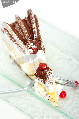 Image of whipped cream and ribes dessert cake slice