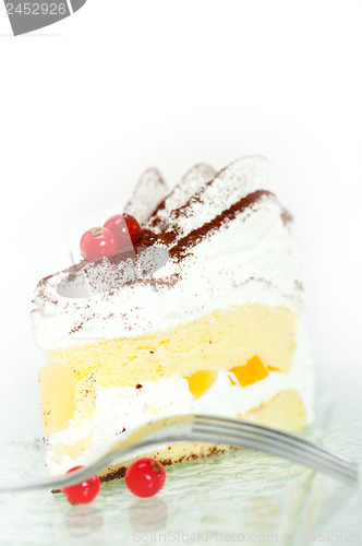 Image of whipped cream and ribes dessert cake slice