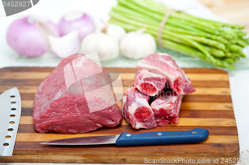 Image of raw beef and pork ribs