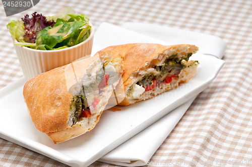 Image of ciabatta panini sandwichwith vegetable and feta