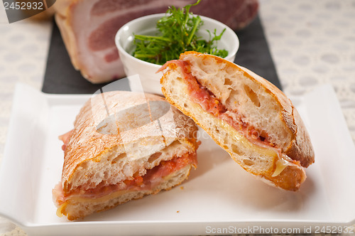 Image of ciabatta panini sandwich with parma ham and tomato