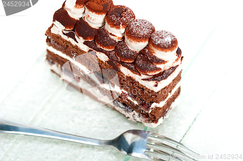 Image of whipped cream dessert cake slice