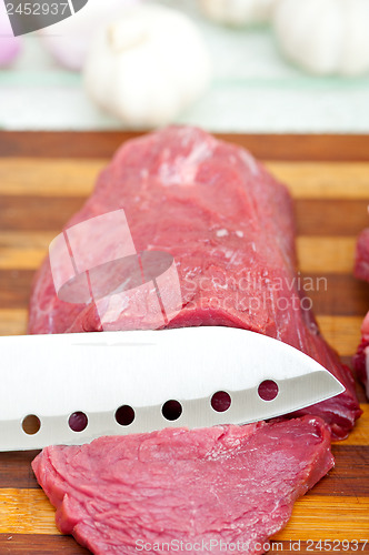 Image of raw beef cutting