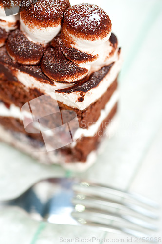 Image of whipped cream dessert cake slice