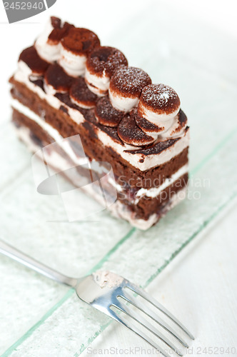 Image of whipped cream dessert cake slice