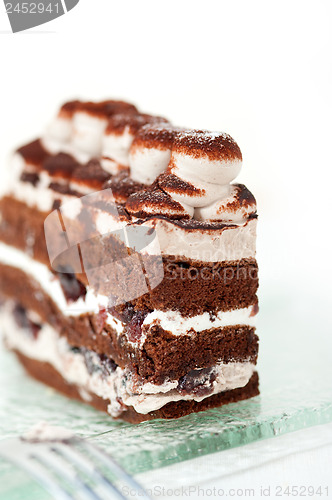 Image of whipped cream dessert cake slice