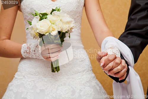 Image of hand with bouquet