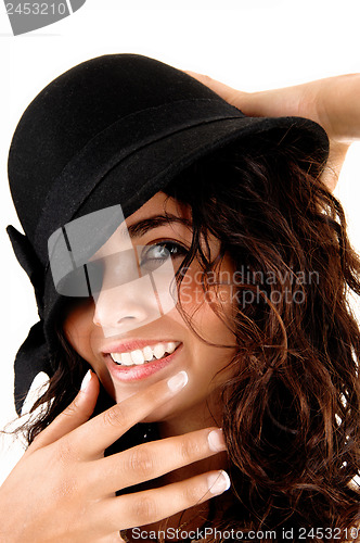 Image of Closeup of girl with hat.