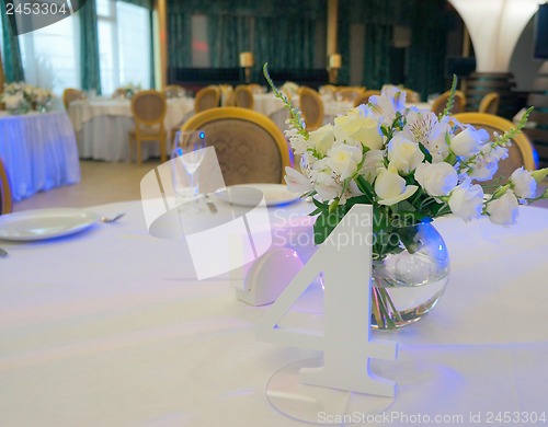 Image of Tables decorated with flowers