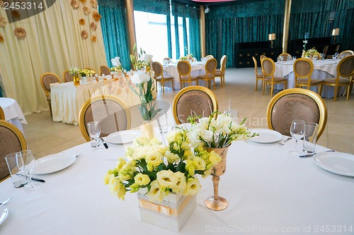 Image of Tables decorated with flowers