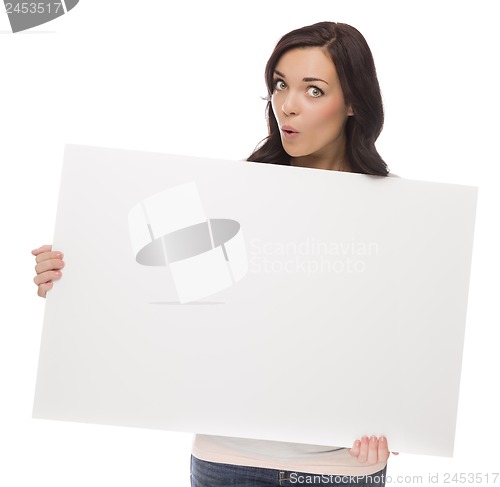 Image of Wide Eyed Mixed Race Female Holding Blank Sign on White
