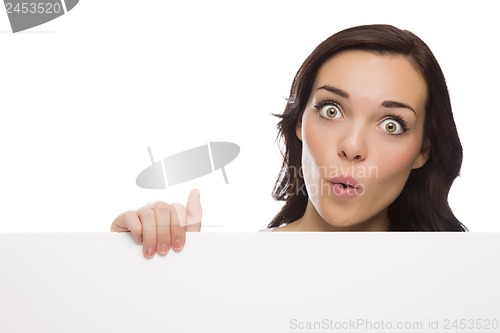 Image of Wide Eyed Mixed Race Female Holding Blank Sign on White
