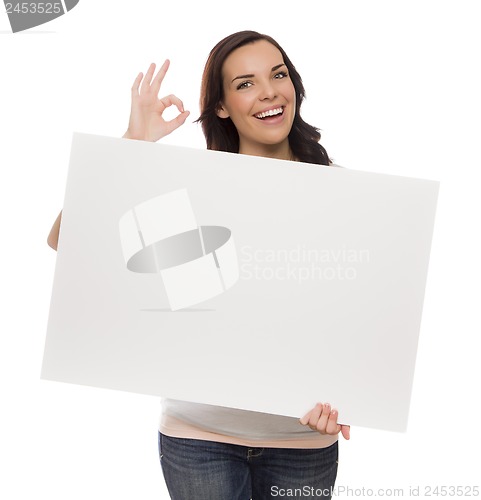 Image of Smiling Mixed Race Female Holding Blank Sign on White
