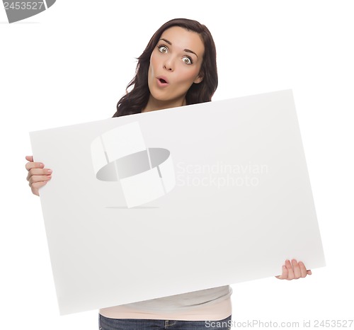 Image of Wide Eyed Mixed Race Female Holding Blank Sign on White
