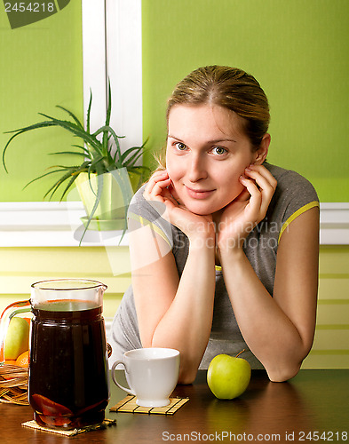 Image of Cute Pregnant Woman On Kitchen