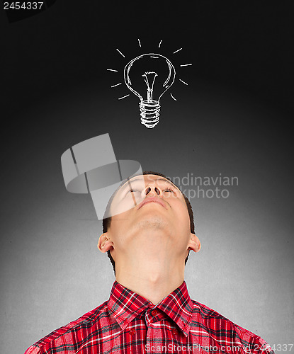 Image of Businessman Looking Upwards