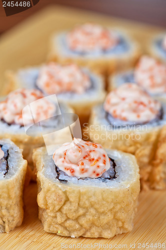 Image of cream cheese and tobico sushi roll