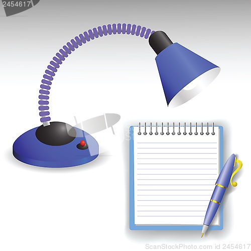 Image of desk lamp and pen