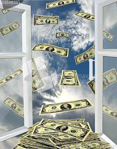 Image of window to the heaven and dollars flying away