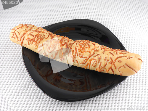 Image of Cheese cake on black plate