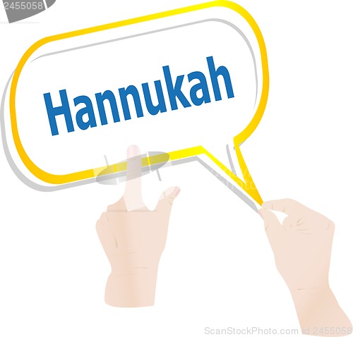 Image of hands holding abstract cloud with hannukah word