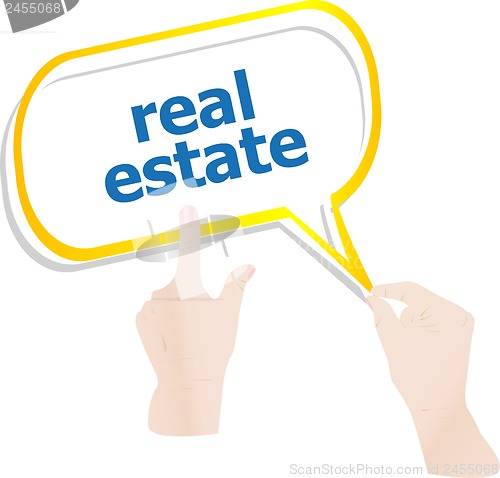 Image of hands holding abstract cloud with real estate word