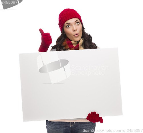 Image of Excited Girl Holds Blank Sign and gives Thumbs Up Gesture