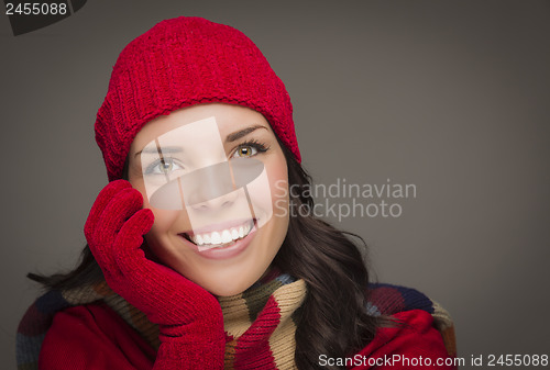 Image of Smilng Mixed Race Woman Wearing Winter Hat and Gloves 