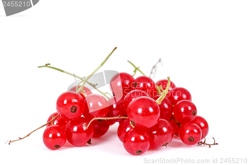 Image of pile berries of red currant on white background