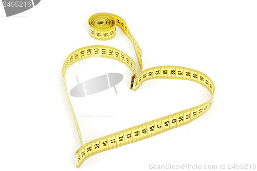 Image of Tape measure heart shape - health, weight concept 