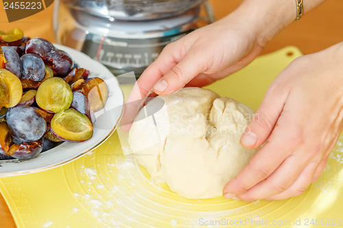 Image of preparing dough for plum cake