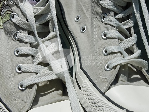 Image of Old sport shoes close up