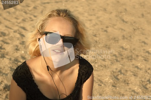 Image of Young girl on the sandy beach