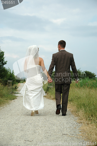 Image of Wedding couple walking