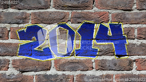 Image of Old dark red brick wall texture  with graffity