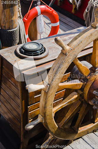 Image of Steering wheel of an old sailing vessel, close up