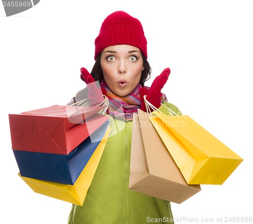 Image of Mixed Race Woman Wearing Hat and Gloves Holding Shopping Bags