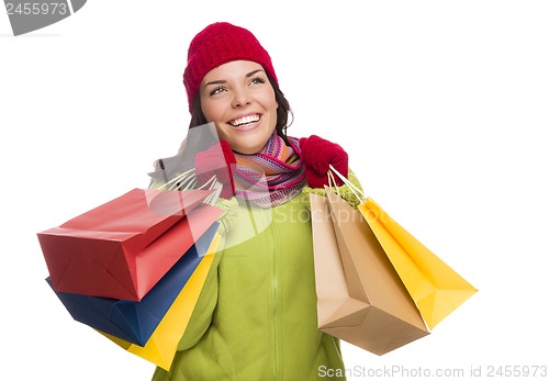Image of Mixed Race Woman Wearing Hat and Gloves Holding Shopping Bags
