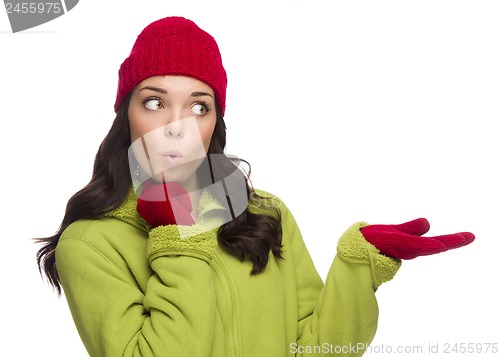 Image of Mixed Race Woman Wearing Hat and Gloves Gesturing to Side