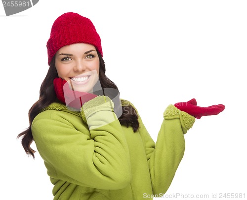 Image of Mixed Race Woman Wearing Hat and Gloves Gesturing to Side